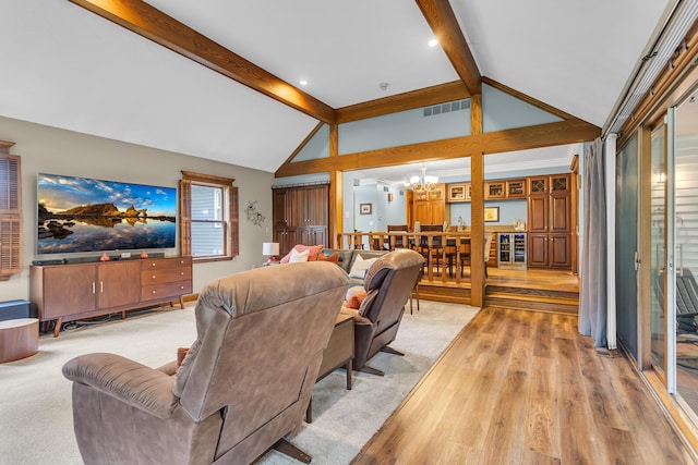 5340 Squires Manor Rd, Jackson, MI 49201 - living area with a chandelier, light wood-style floors, and wine cooler