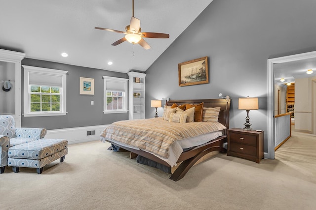 5340 Squires Manor Rd, Jackson, MI 49201 - bedroom with light carpet, ceiling fan, recessed lighting, high vaulted ceiling, and a wainscoted wall
