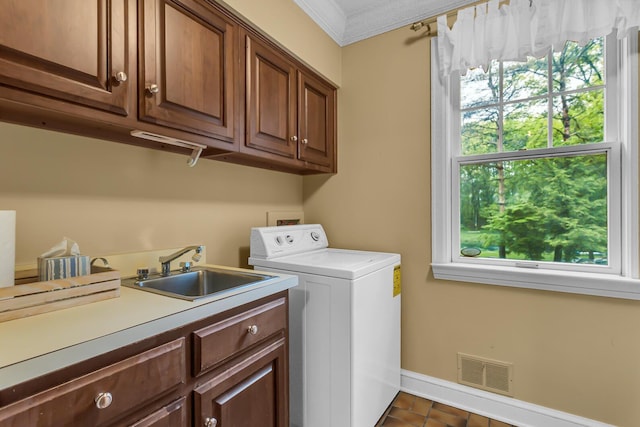 5340 Squires Manor Rd, Jackson, MI 49201 - laundry area with washer / dryer, cabinet space, baseboards, and crown molding