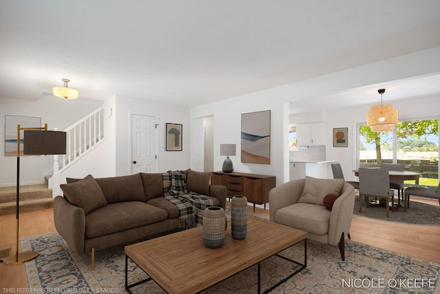 7745 Worthing Ct SW, Byron Center, MI 49315 - living area with light wood-type flooring and stairs