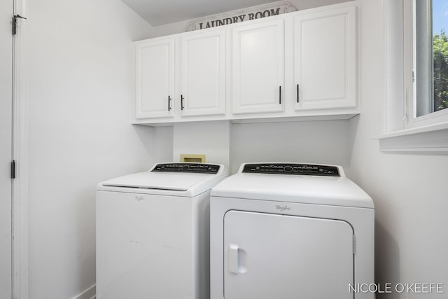 7745 Worthing Ct SW, Byron Center, MI 49315 - laundry room featuring separate washer and dryer and cabinet space
