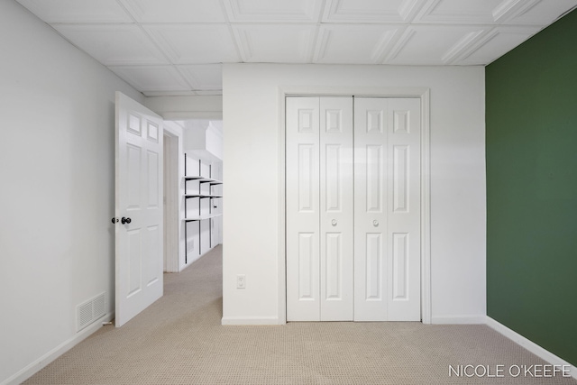 7745 Worthing Ct SW, Byron Center, MI 49315 - unfurnished bedroom featuring light carpet and a closet