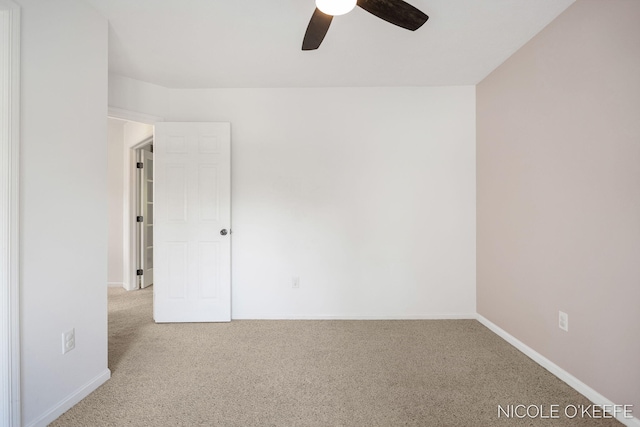 7745 Worthing Ct SW, Byron Center, MI 49315 - carpeted spare room with a ceiling fan and baseboards