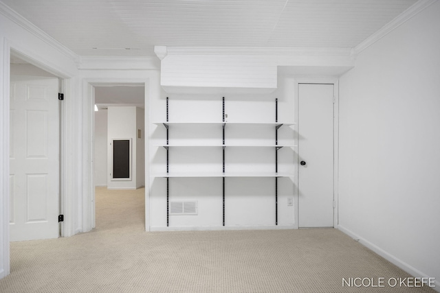 7745 Worthing Ct SW, Byron Center, MI 49315 - unfurnished bedroom featuring carpet floors and crown molding