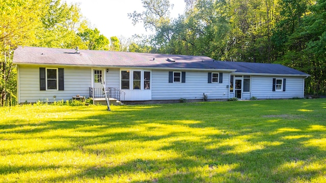 6340 Warren Woods Rd, Three Oaks, MI 49128 - rear view of house with a yard