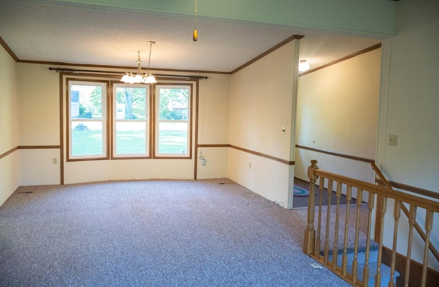 6340 Warren Woods Rd, Three Oaks, MI 49128 - carpeted empty room with ornamental molding and a chandelier