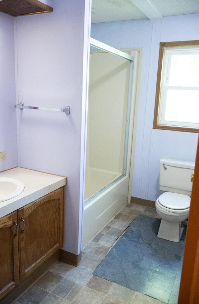 6340 Warren Woods Rd, Three Oaks, MI 49128 - bathroom with vanity, toilet, and combined bath / shower with glass door