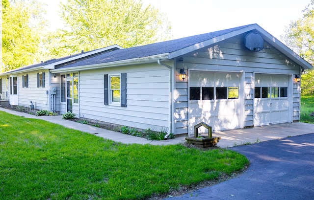 6340 Warren Woods Rd, Three Oaks, MI 49128 - ranch-style house with a garage and a front yard