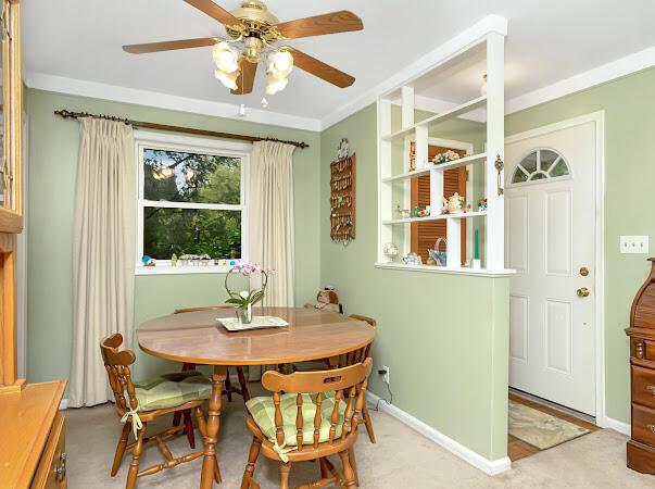 23165 Church St, Oak Park, MI 48237 - dining room with a ceiling fan and baseboards