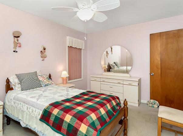 23165 Church St, Oak Park, MI 48237 - bedroom featuring light colored carpet and ceiling fan