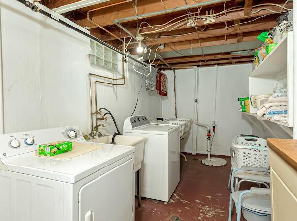 23165 Church St, Oak Park, MI 48237 - laundry area with separate washer and dryer