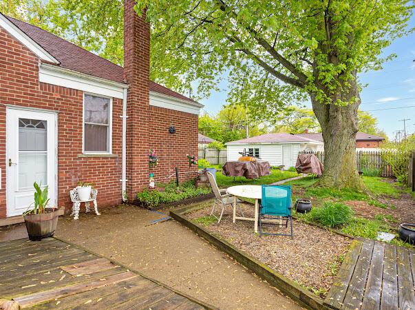 23165 Church St, Oak Park, MI 48237 - view of patio / terrace with a deck and outdoor dining area