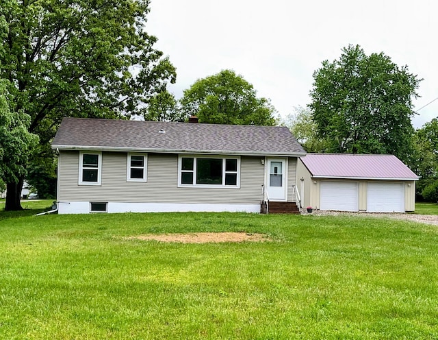 70025 Union Rd, Union, MI 49130 - view of front of home featuring entry steps, a front lawn, a garage, and a shingled roof