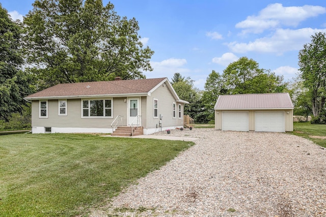 70025 Union Rd, Union, MI 49130 - ranch-style home featuring an outbuilding, a detached garage, and a front yard