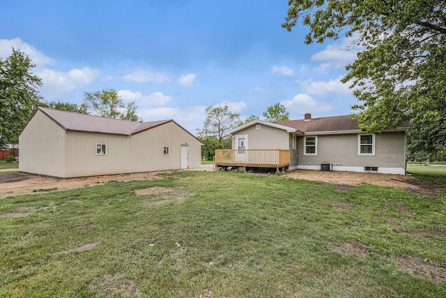70025 Union Rd, Union, MI 49130 - rear view of property with a wooden deck, a yard, a chimney, and central AC
