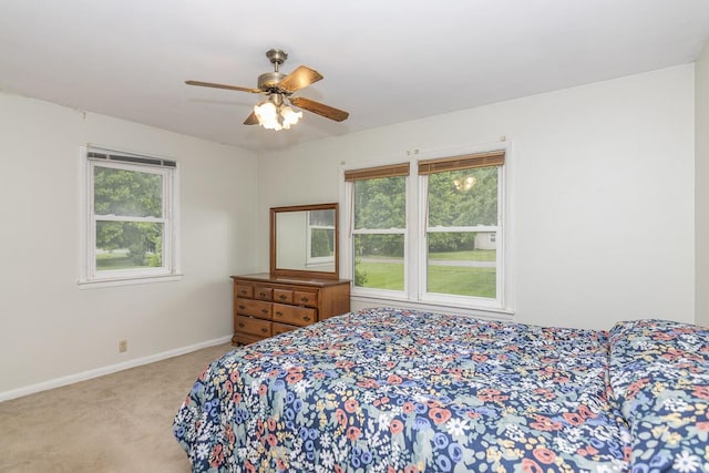 455 N Centre St, Schoolcraft, MI 49087 - carpeted bedroom featuring baseboards and a ceiling fan