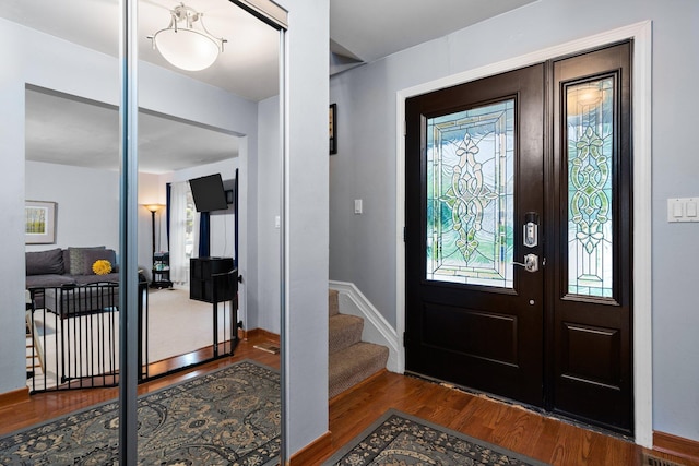 927 Queens Way, Canton, MI 48188 - foyer featuring wood finished floors, stairs, and baseboards