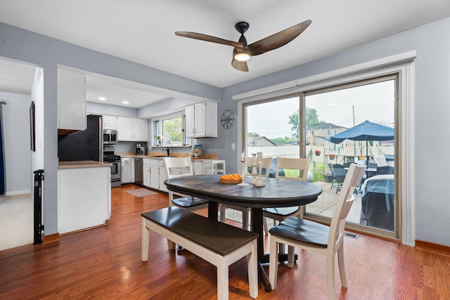 927 Queens Way, Canton, MI 48188 - dining space with ceiling fan, dark wood-style flooring, and baseboards