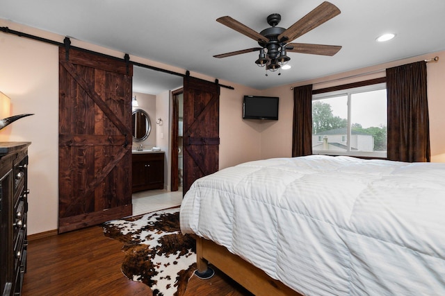 927 Queens Way, Canton, MI 48188 - bedroom featuring a barn door, wood finished floors, recessed lighting, baseboards, and a ceiling fan