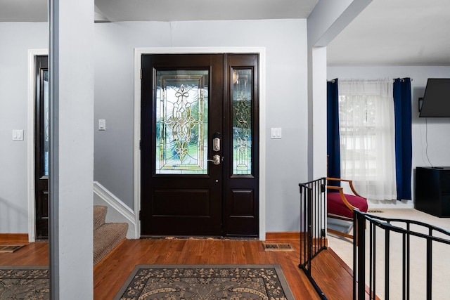 927 Queens Way, Canton, MI 48188 - entrance foyer with wood finished floors, stairway, and baseboards