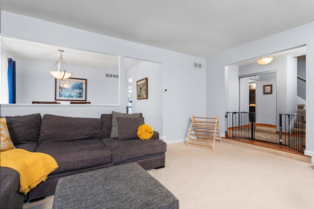 927 Queens Way, Canton, MI 48188 - carpeted living area featuring stairway and baseboards