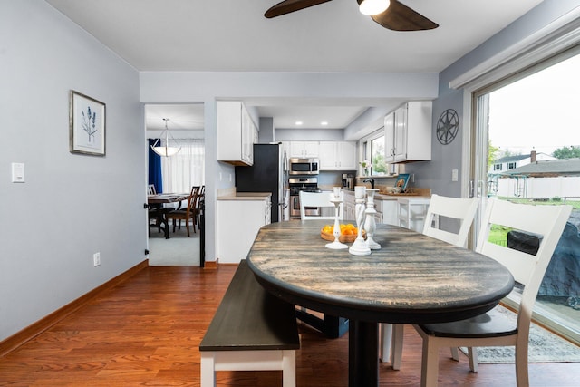 927 Queens Way, Canton, MI 48188 - dining space with ceiling fan, baseboards, and wood finished floors