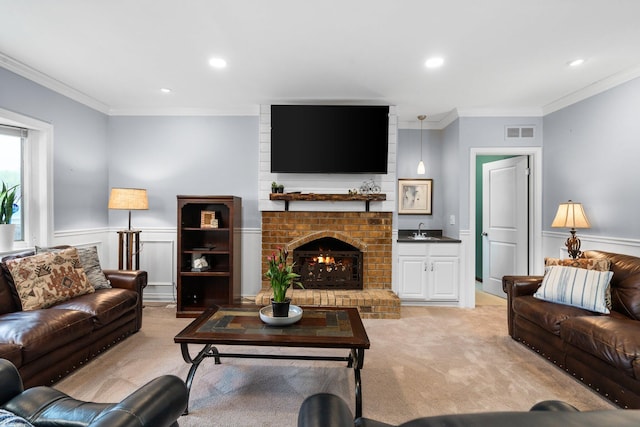 927 Queens Way, Canton, MI 48188 - living area featuring crown molding, a brick fireplace, recessed lighting, wainscoting, and light carpet