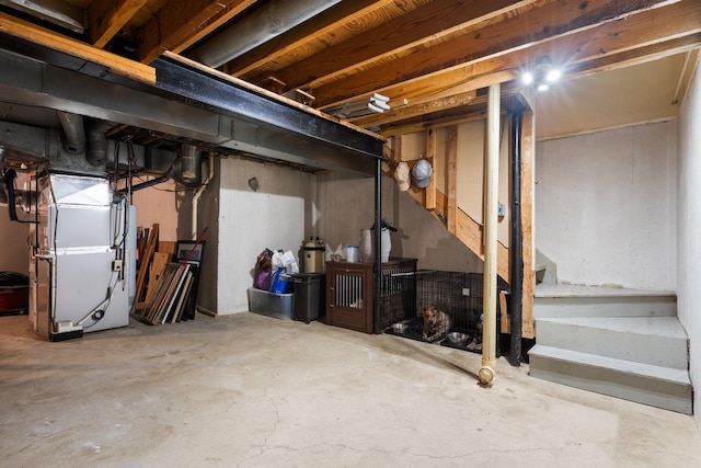 927 Queens Way, Canton, MI 48188 - unfinished basement featuring heating unit and stairs