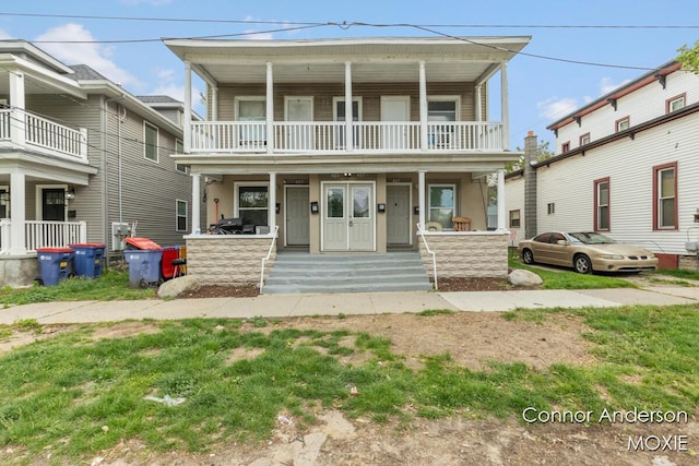 407 11th St NW Unit 409, Grand Rapids, MI 49504 - view of front facade with a porch and a balcony