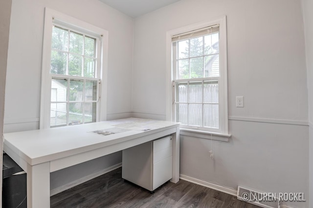 839 Joslin St SE, Grand Rapids, MI 49507 - unfurnished office featuring plenty of natural light, dark wood finished floors, and baseboards