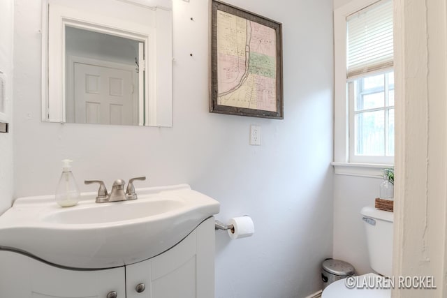 839 Joslin St SE, Grand Rapids, MI 49507 - bathroom featuring vanity and toilet