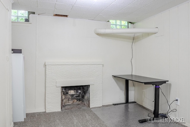 839 Joslin St SE, Grand Rapids, MI 49507 - unfurnished living room featuring a fireplace