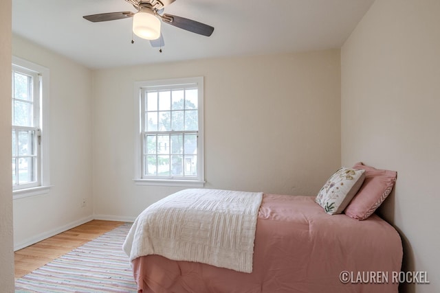 839 Joslin St SE, Grand Rapids, MI 49507 - bedroom with wood finished floors, baseboards, and ceiling fan