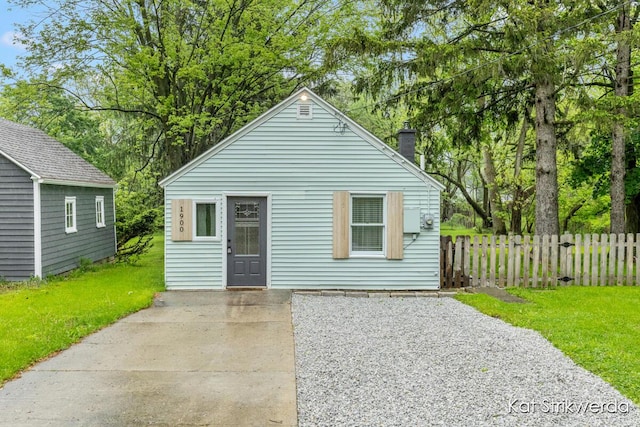 1900 Kinney Ave NW, Grand Rapids, MI 49534 - view of front of house with a chimney