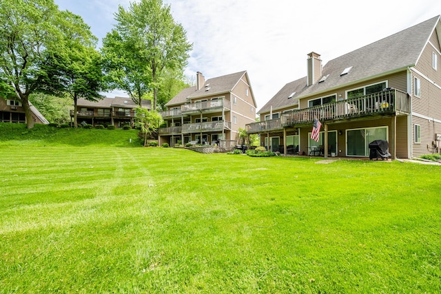 5632 N Watervliet Rd Unit 22, Watervliet, MI 49098 - view of green lawn featuring a wooden deck