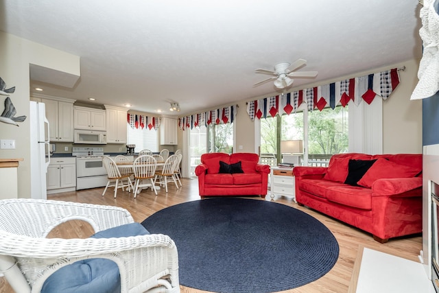 5632 N Watervliet Rd Unit 22, Watervliet, MI 49098 - living room featuring a ceiling fan, light wood-style floors, and recessed lighting
