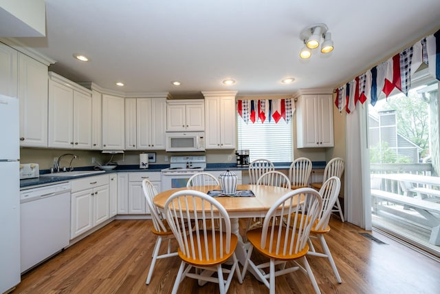 5632 N Watervliet Rd Unit 22, Watervliet, MI 49098 - dining space with light wood-style floors and recessed lighting