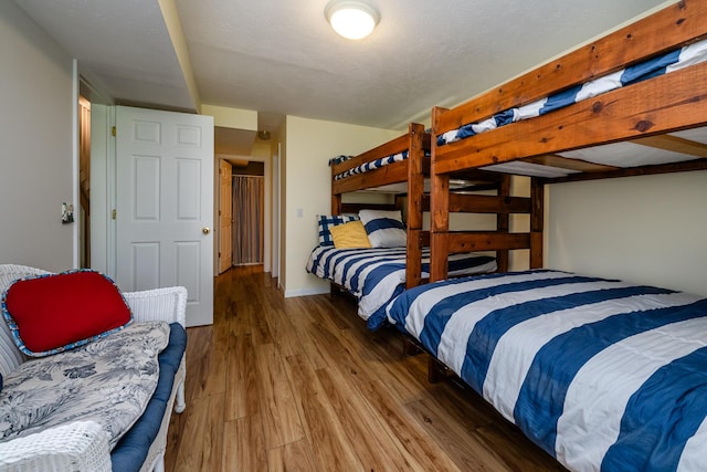 5632 N Watervliet Rd Unit 22, Watervliet, MI 49098 - bedroom with wood finished floors