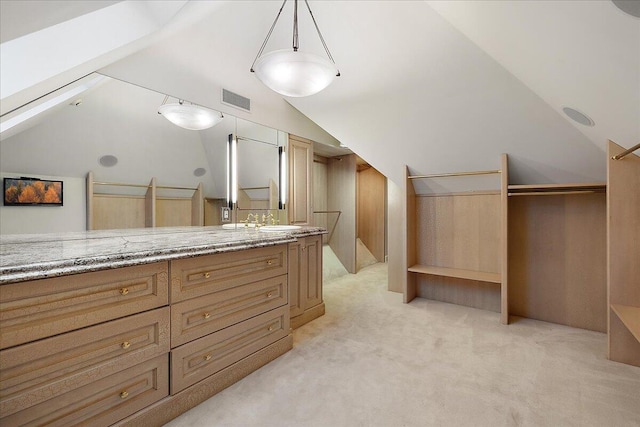 490 E Long Lake Rd, Bloomfield Hills, MI 48304 - bathroom featuring lofted ceiling, double vanity, and a closet