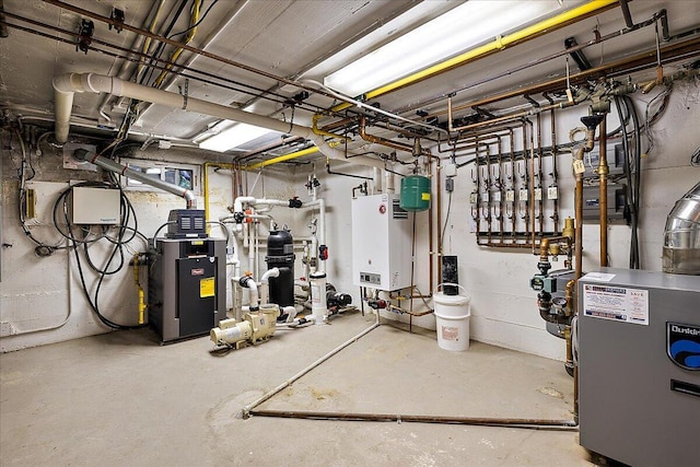 490 E Long Lake Rd, Bloomfield Hills, MI 48304 - utility room featuring tankless water heater and a heating unit