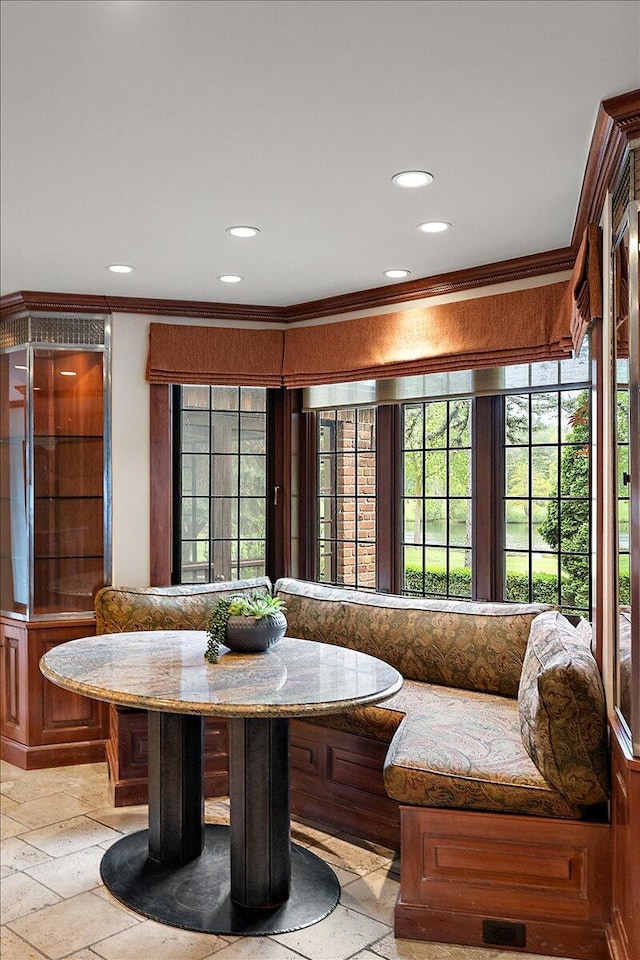 490 E Long Lake Rd, Bloomfield Hills, MI 48304 - dining room with breakfast area, plenty of natural light, recessed lighting, crown molding, and stone tile flooring