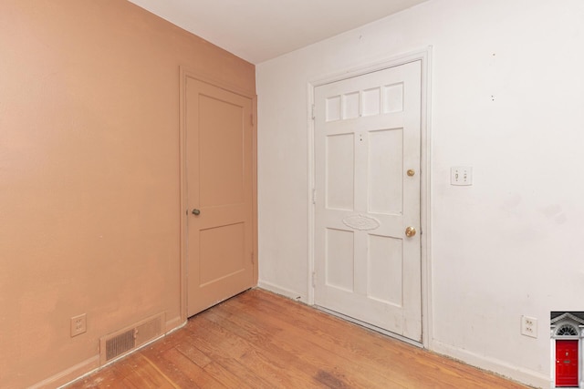 1506 Chandler Rd, Ann Arbor, MI 48105 - unfurnished room with light wood-type flooring and baseboards