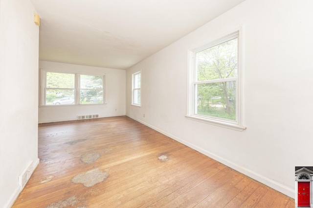 1506 Chandler Rd, Ann Arbor, MI 48105 - unfurnished room featuring wood-type flooring and baseboards