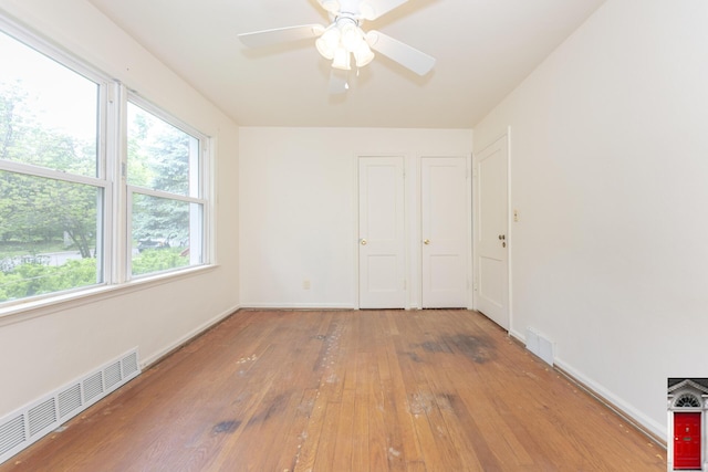 1506 Chandler Rd, Ann Arbor, MI 48105 - spare room with hardwood / wood-style floors, baseboards, and ceiling fan