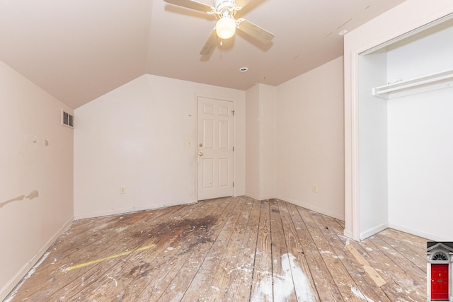 1506 Chandler Rd, Ann Arbor, MI 48105 - unfurnished bedroom featuring hardwood / wood-style flooring, lofted ceiling, a ceiling fan, and baseboards