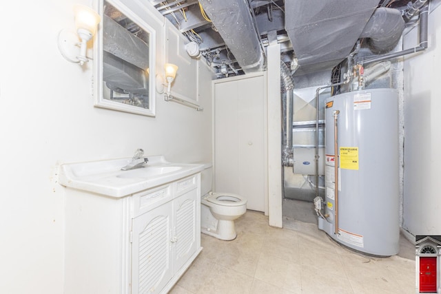 1506 Chandler Rd, Ann Arbor, MI 48105 - bathroom featuring gas water heater, vanity, and toilet