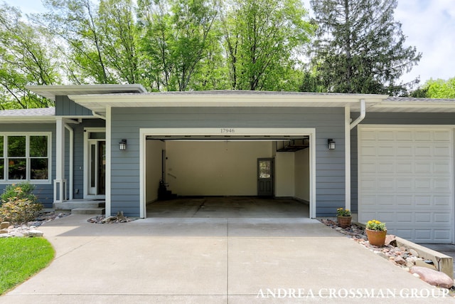 17946 Robbins Rd, Grand Haven, MI 49417 - garage featuring driveway