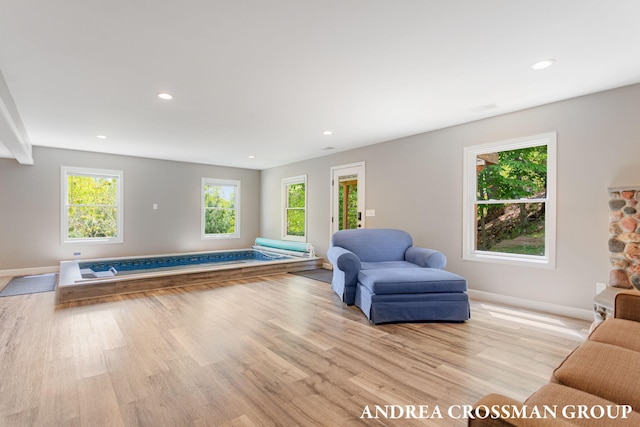 17946 Robbins Rd, Grand Haven, MI 49417 - living area featuring baseboards, recessed lighting, and light wood-type flooring