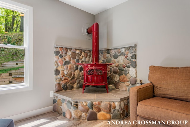 17946 Robbins Rd, Grand Haven, MI 49417 - detailed view of a wood stove and wood finished floors