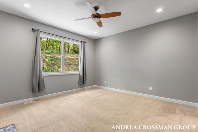 17946 Robbins Rd, Grand Haven, MI 49417 - spare room featuring light colored carpet, a ceiling fan, baseboards, and recessed lighting
